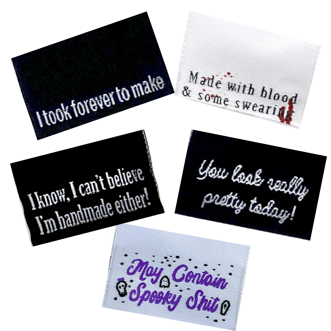Set of woven fabric sew-in labels on a white background.